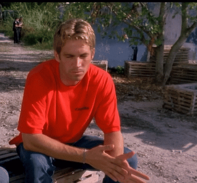 A Man Wearing A Red Shirt That Says Columbia On It GIF