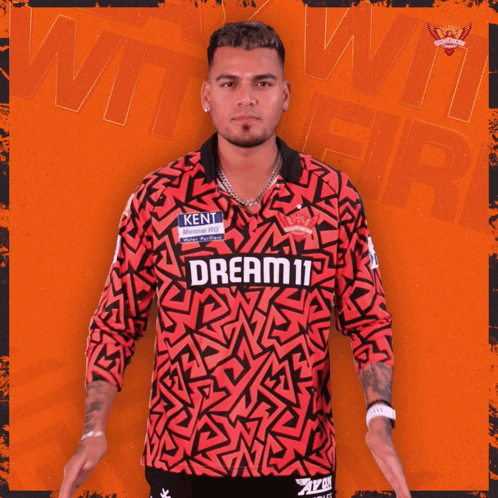 A Man Wearing A Red Shirt That Says Dream11 GIF