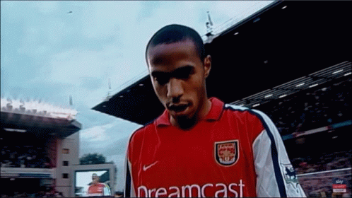 A Man Wearing A Red Shirt That Says Dreamcast On It GIF