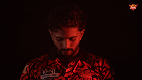 A Man Wearing A Red Shirt That Says Ken GIF
