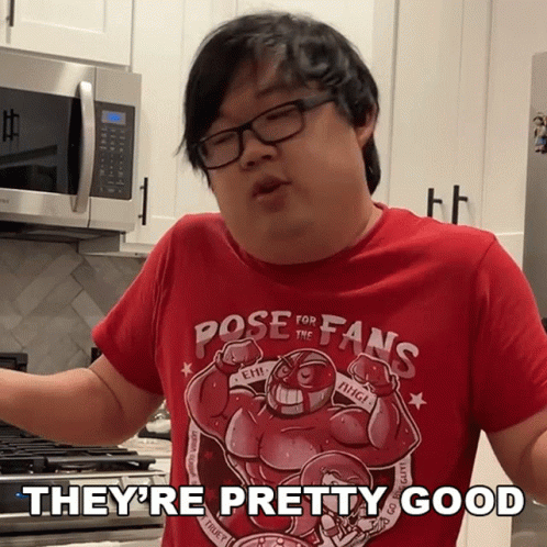 A Man Wearing A Red Shirt That Says Pose For The Fans GIF