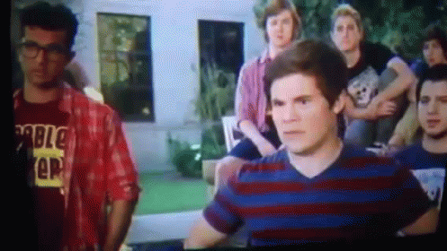 A Man Wearing A Red Shirt That Says ' Rumble Ep ' On It GIF