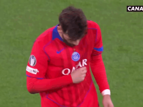 A Man Wearing A Red Shirt That Says Star Airways Holds His Hand To His Chest GIF