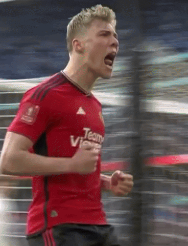 A Man Wearing A Red Shirt That Says Team Vi GIF