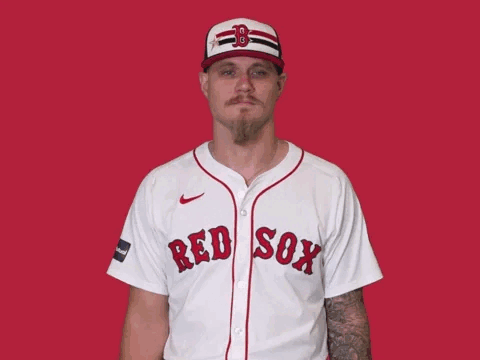 A Man Wearing A Red Sox Jersey And Hat GIF