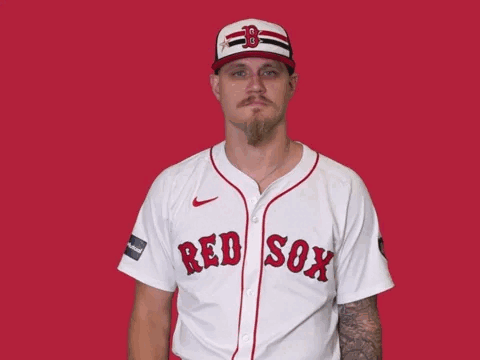 A Man Wearing A Red Sox Jersey And Hat GIF