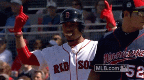 A Man Wearing A Red Sox Jersey Is Giving A Thumbs Up Sign GIF