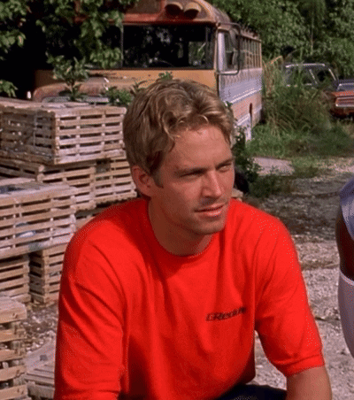 A Man Wearing A Red T-Shirt With The Word Greddy On It GIF