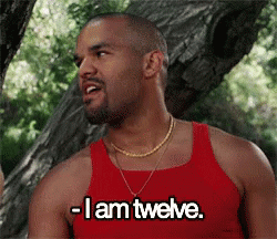 A Man Wearing A Red Tank Top Says I Am Twelve GIF