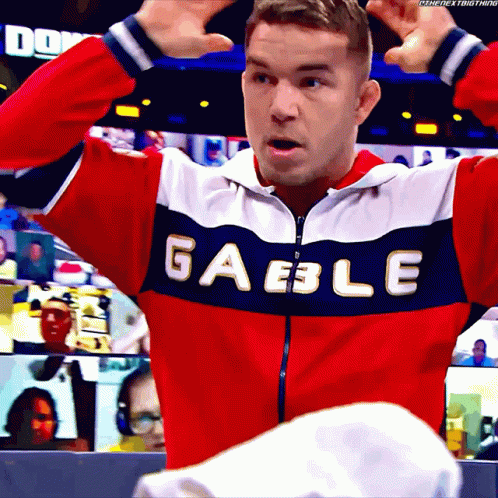 A Man Wearing A Red White And Blue Jacket That Says Gaeble On It GIF
