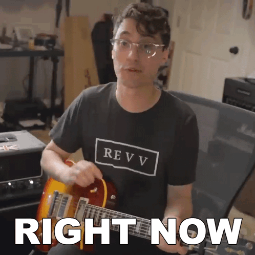 Man In Revv Shirt Playing Guitar GIF