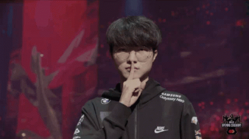 A Man Wearing A Samsung Odyssey Neo Hoodie Stands In Front Of A Crowd GIF
