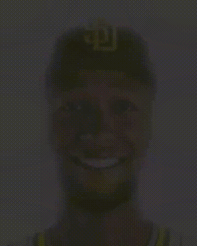 A Man Wearing A San Diego Padres Baseball Cap Is Smiling GIF
