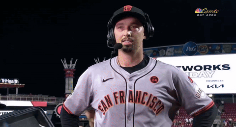 A Man Wearing A San Francisco Jersey With A Microphone GIF