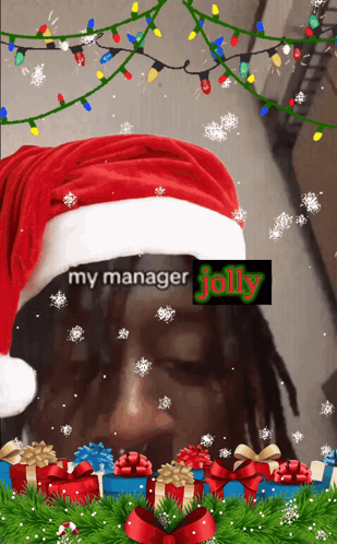 A Man Wearing A Santa Hat With The Words " My Manager Jolly " GIF