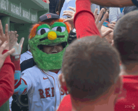 A Man Wearing A Sesame Street Mask With The Word Rei On His Jersey GIF