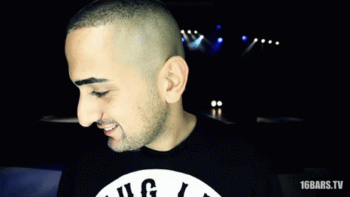 A Man Wearing A Shirt That Says 16 Bars GIF
