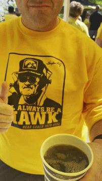 A Man Wearing A Shirt That Says Always Be A Hawk GIF