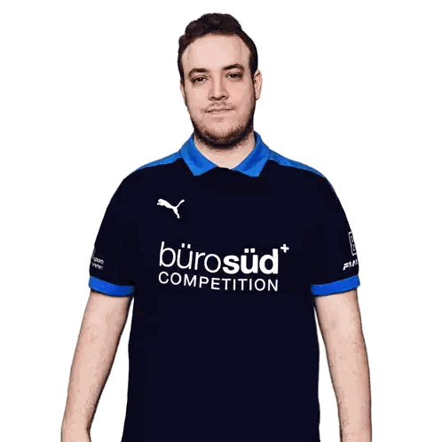 a man wearing a shirt that says bürosuid competition