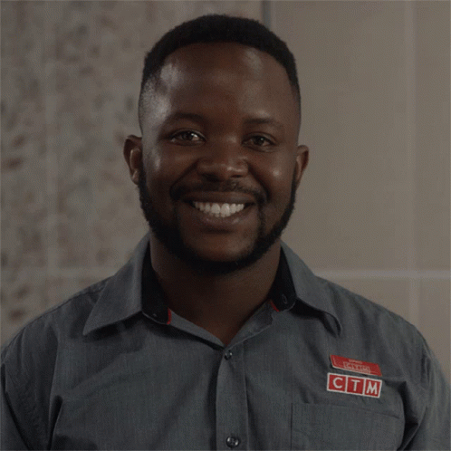A Man Wearing A Shirt That Says Ctm Smiles GIF
