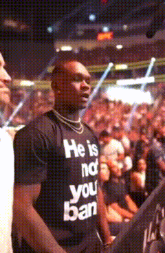 A Man Wearing A Shirt That Says He Is Not Your Ban GIF
