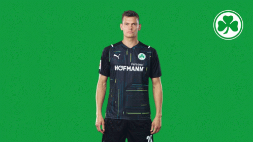 A Man Wearing A Shirt That Says Hoffmann On It GIF