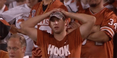 A Man Wearing A Shirt That Says Hook On It GIF