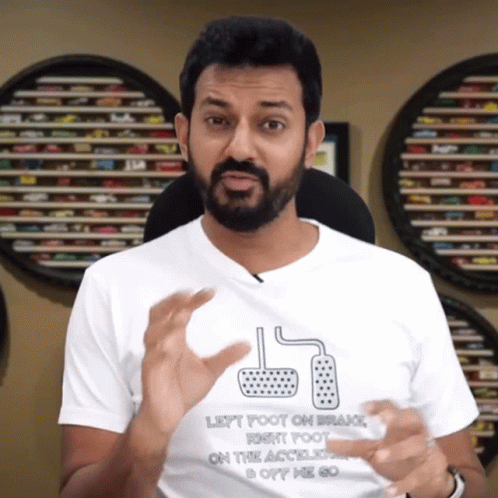 A Man Wearing A Shirt That Says Left Foot On Brake Right Foot On The Accelerator GIF