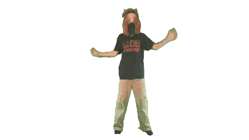 a man wearing a shirt that says " made looking " stands in front of a planet