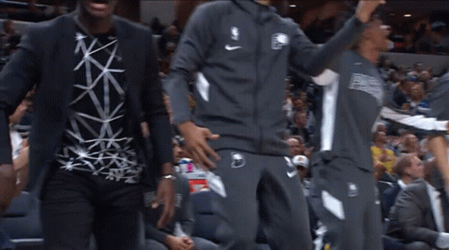A Man Wearing A Shirt That Says ' Nba ' On It GIF