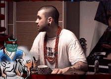 a man wearing a shirt that says ' nc hip hop ' on it