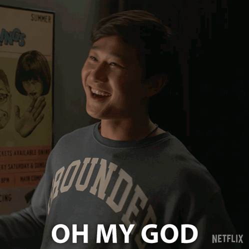 A Man Wearing A Shirt That Says Oh My God GIF