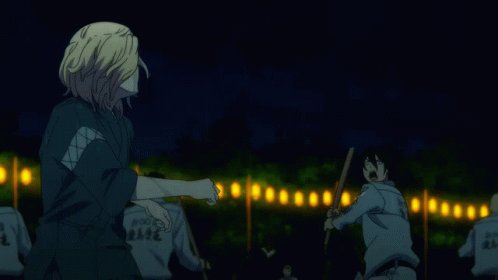 A Man Wearing A Shirt That Says ' Police ' On It Is Fighting Another Man GIF