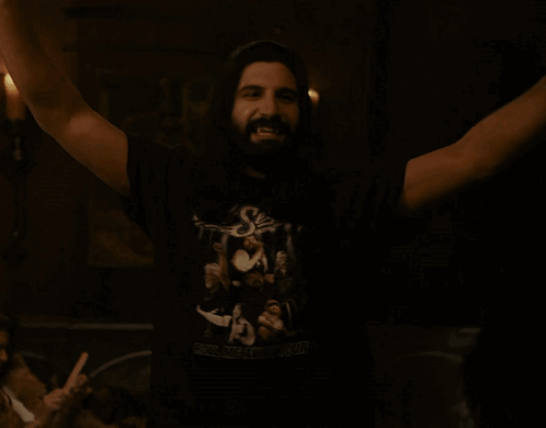 A Man Wearing A Shirt That Says ' Rolling Away ' On It GIF