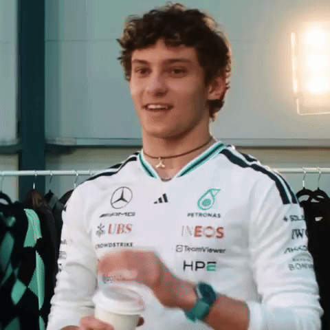 A Man Wearing A Shirt That Says Ubs And Ineos On It GIF