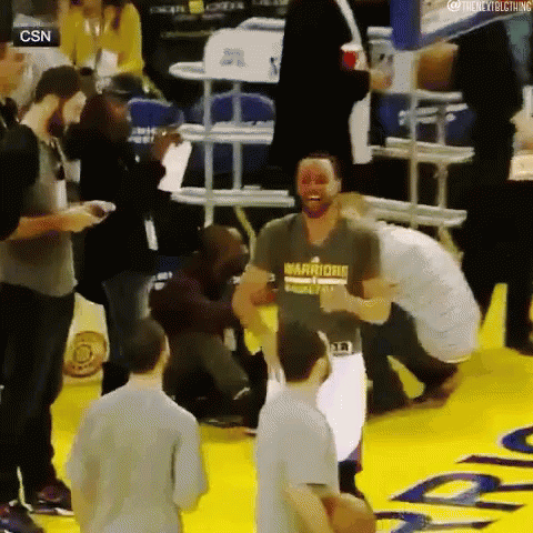 A Man Wearing A Shirt That Says Warriors On It Is Dancing On The Court GIF