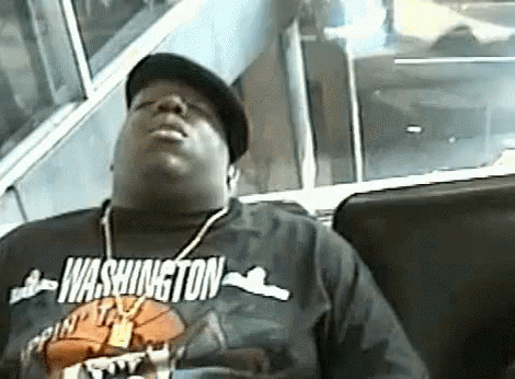 A Man Wearing A Shirt That Says Washington On It GIF