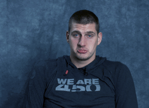 A Man Wearing A Shirt That Says " We Are Nike " On It GIF