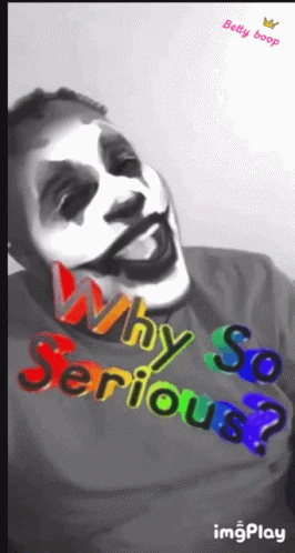 A Man Wearing A Shirt That Says " Why So Serious " GIF
