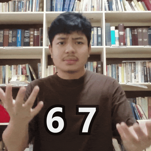 A Man Wearing A Shirt With The Number 67 On The Front GIF