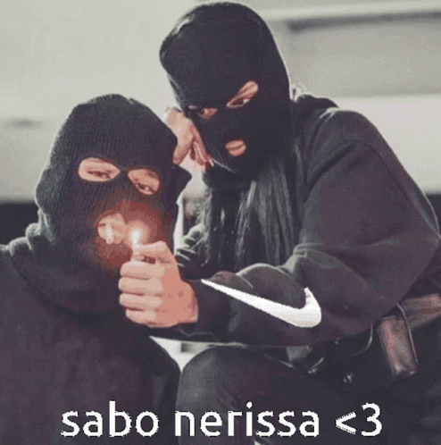 A Man Wearing A Ski Mask Lighting A Cigarette Next To A Woman Wearing A Nike Shirt GIF