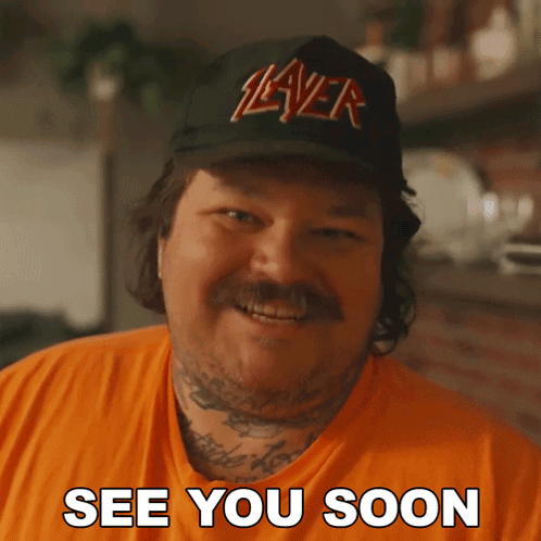 A Man Wearing A Slayer Hat Is Smiling And Says See You Soon GIF
