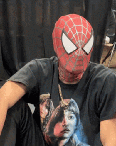 A Man Wearing A Spider-Man Mask And A Black T-Shirt GIF