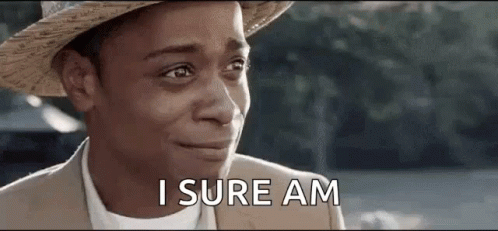 A Man Wearing A Straw Hat And A Suit Is Crying And Saying `` I Sure Am '' . GIF