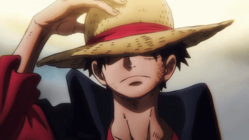 A Man Wearing A Straw Hat With A Red Ribbon GIF