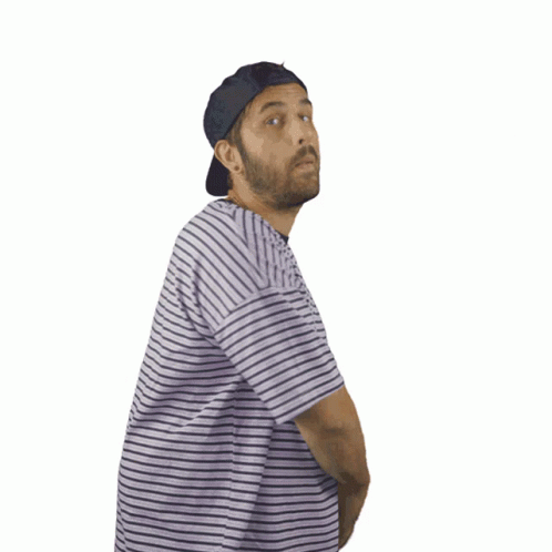 A Man Wearing A Striped Shirt And A Hat Is Making A Heart Shape With His Hands GIF