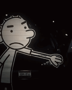 A Man Wearing A Striped Shirt And Tie Looks At The Camera GIF