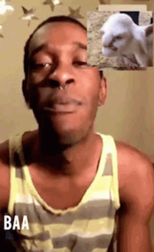 A Man Wearing A Striped Tank Top Says Baa In Front Of A Picture Of A Goat GIF
