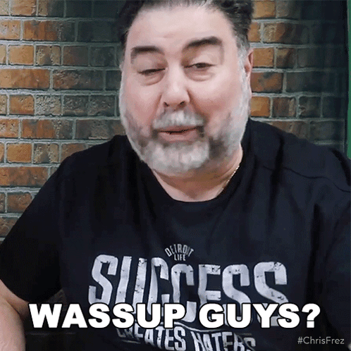 A Man Wearing A Success Wassup Guys Shirt GIF