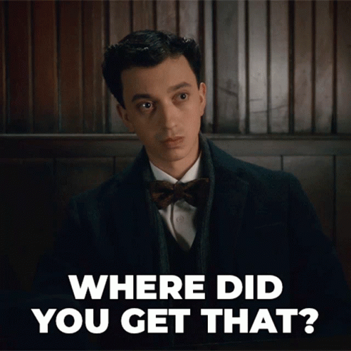A Man Wearing A Suit And Bow Tie Is Asking Where Did You Get That GIF